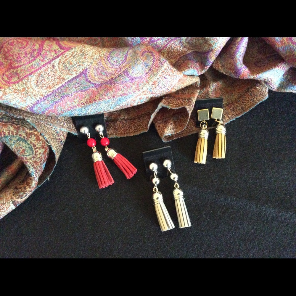 Handmade leather tassel earrings.